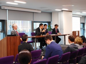 Minster Horiuchi (sitting, left) and Mr Nagawa (right)